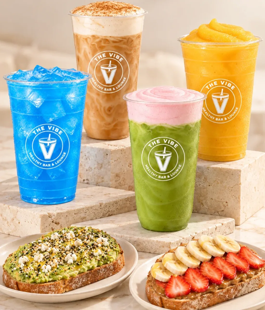 Blue Blast Energy, a Brown Sugar Cinnamon latte, Strawberry Matcha and a Pineapple Mango smoothie with two loaded toasts